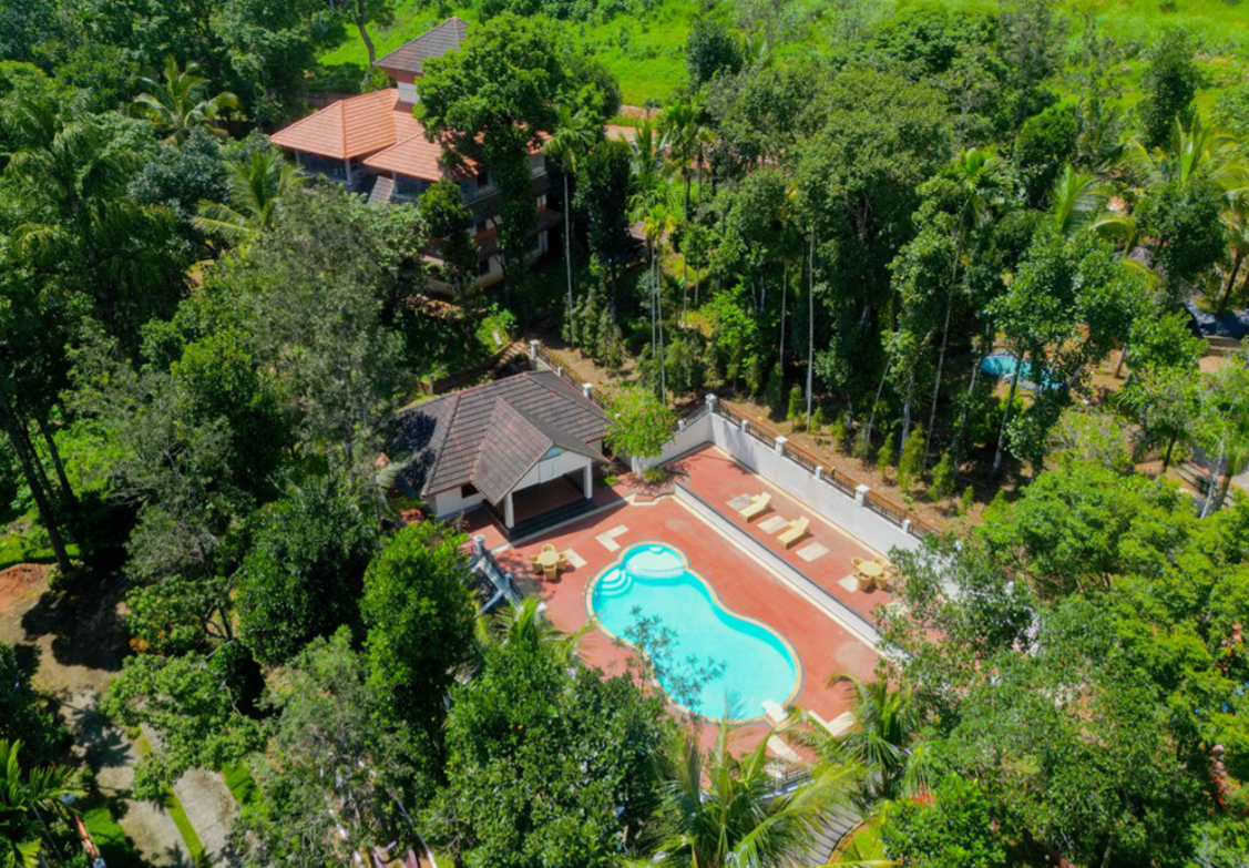 Outdoor Swimming Pool at Ushasree Resort